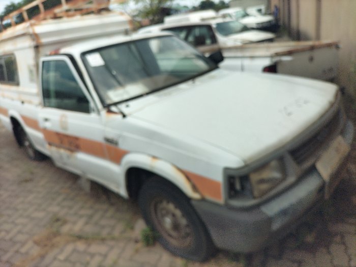 FORD COURIER (WHITE)