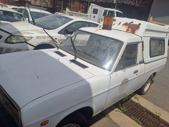 NISSAN (WHITE)